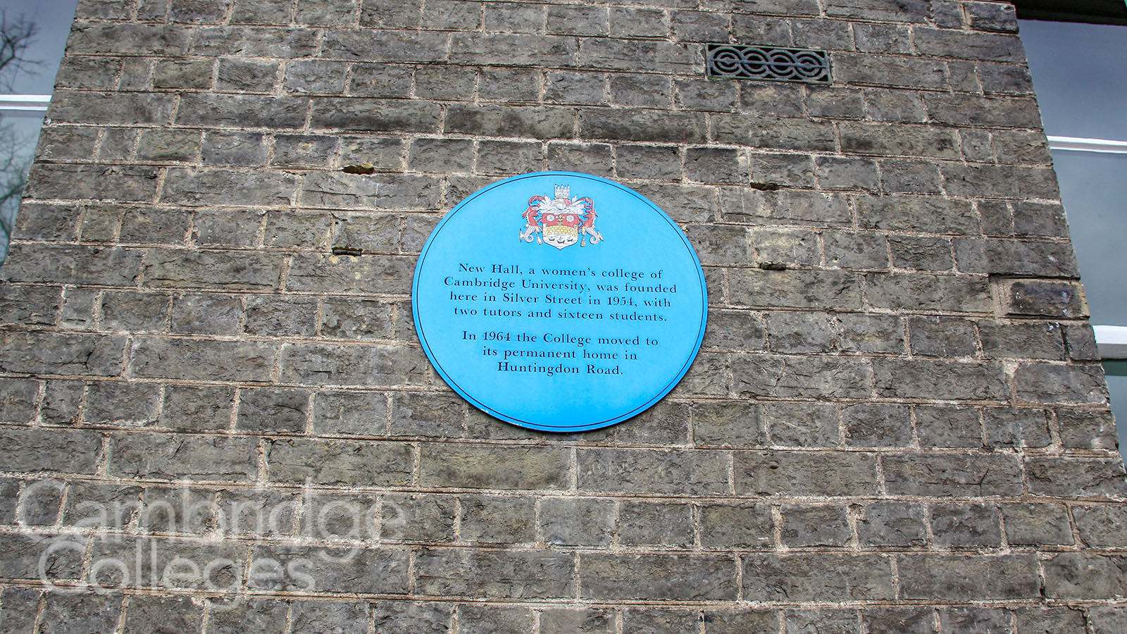 A blue plaque commemorates the original site of New Hall