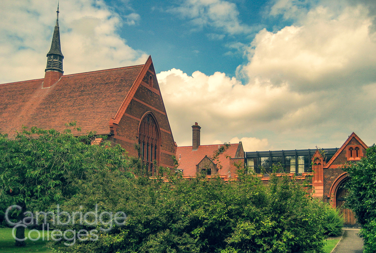 Girton College chapel, partially obscured by trees